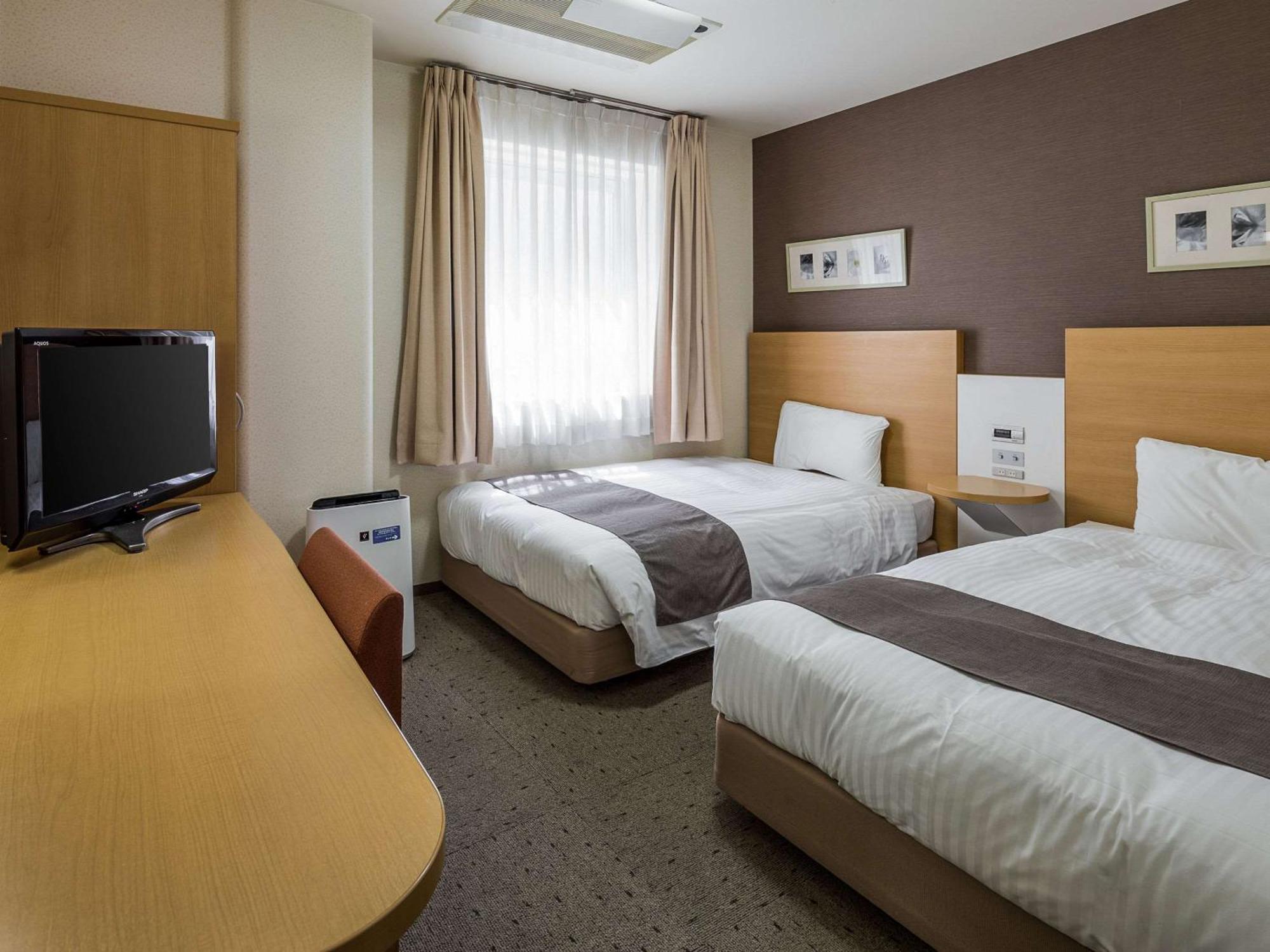 Comfort Hotel Tendo Exterior foto